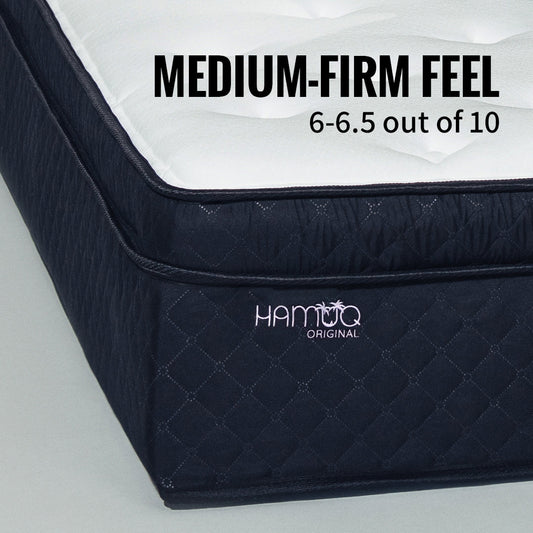 Corner of the Hamuq Original Hybrid mattress with the label Medium-firm feel, 6 to 6.5 out of 10